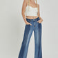 RISEN Full Size Mid-Rise Waist Two-Tones Jeans with Pockets